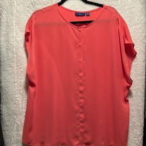 Salmon color plus size short sleeve shirt.